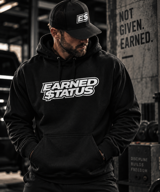 Earned $tatus black hoodie lifestyle hero image